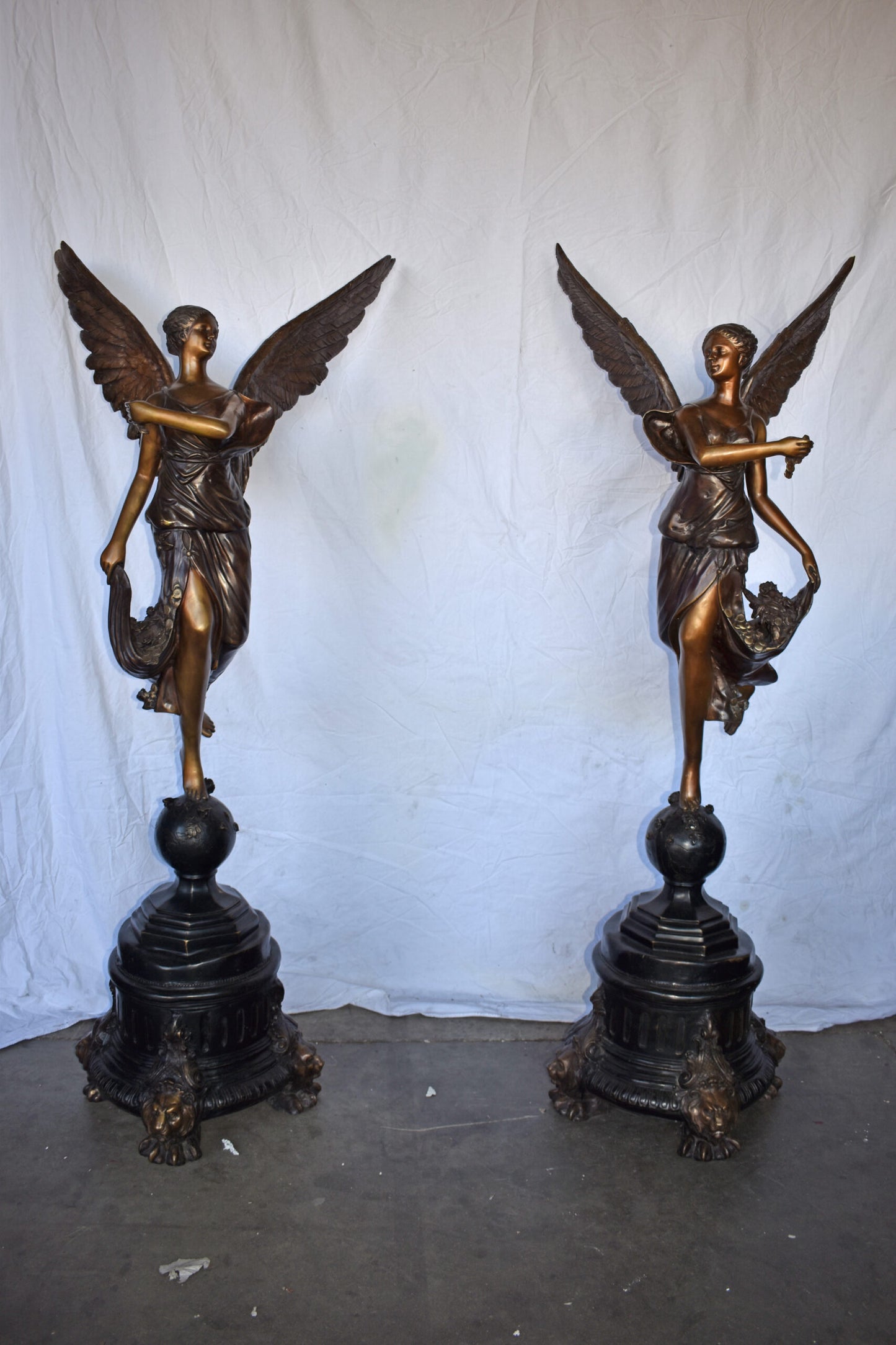 A Pair of Angels of Fortune Bronze Statues  Size: 27" x 27" x 69"H
