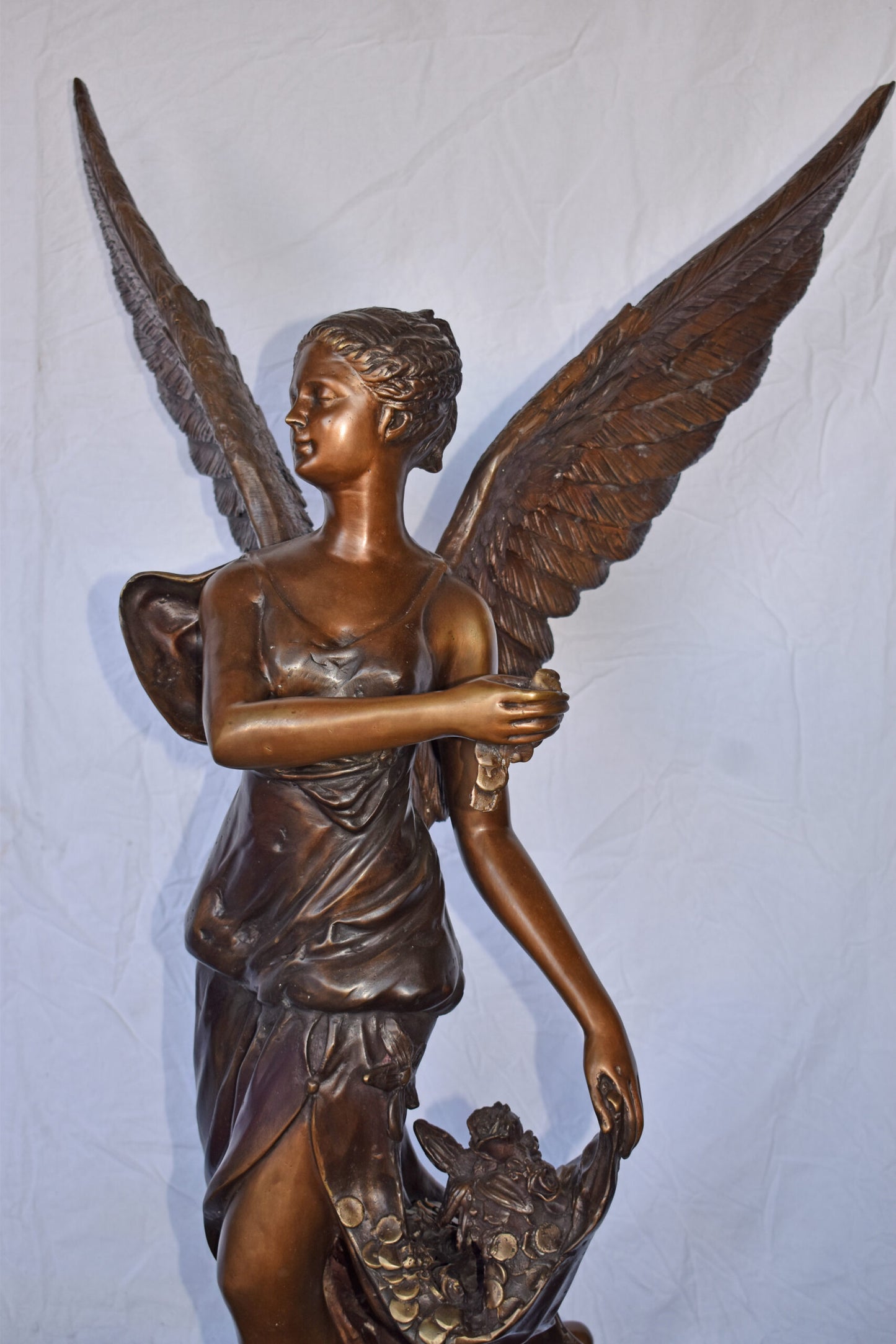 A Pair of Angels of Fortune Bronze Statues  Size: 27" x 27" x 69"H