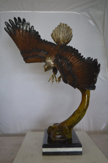 Eagle Soaring Bronze Statue by W Aribu -  Size: 35"L x 27"W x 38"H.
