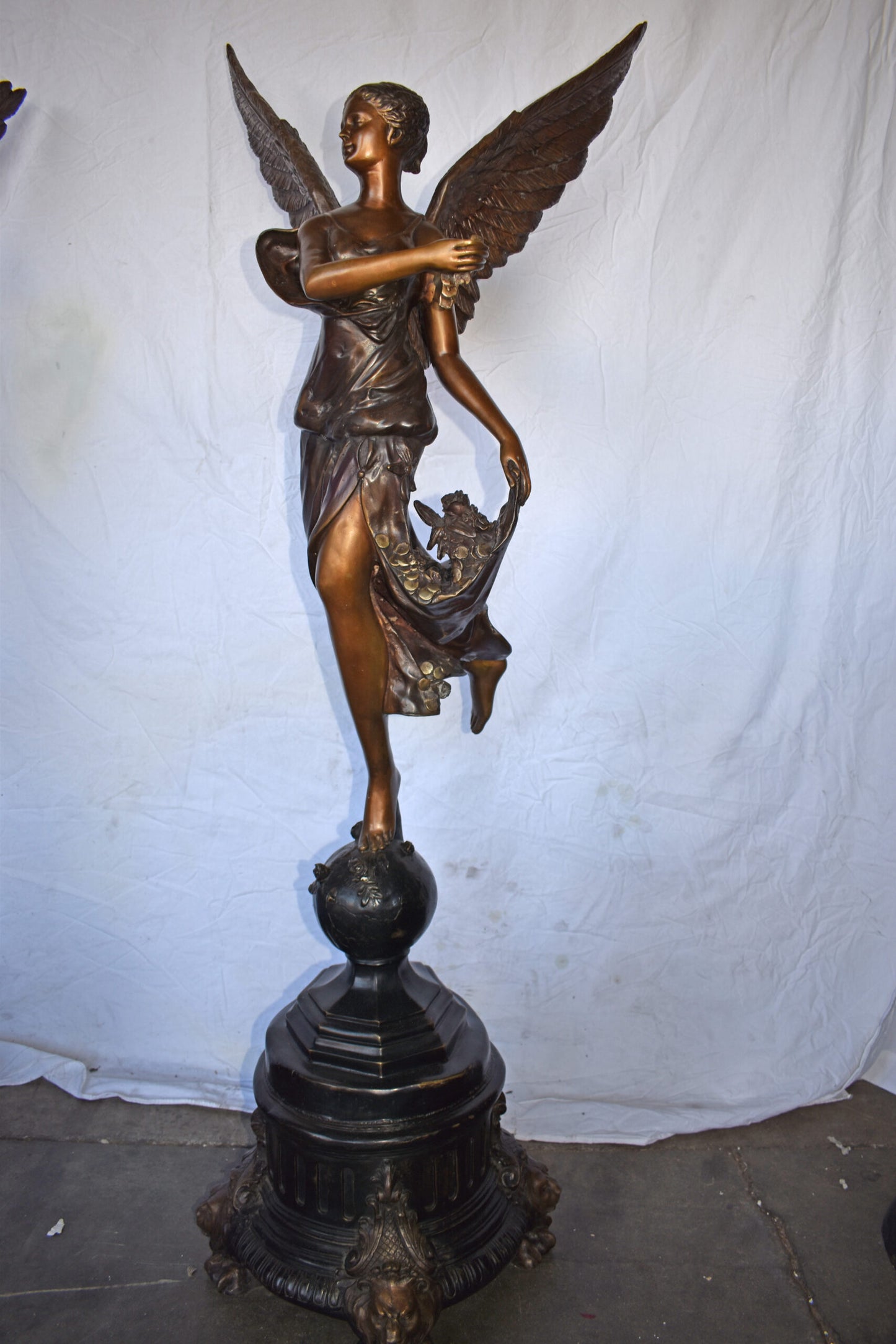 A Pair of Angels of Fortune Bronze Statues  Size: 27" x 27" x 69"H