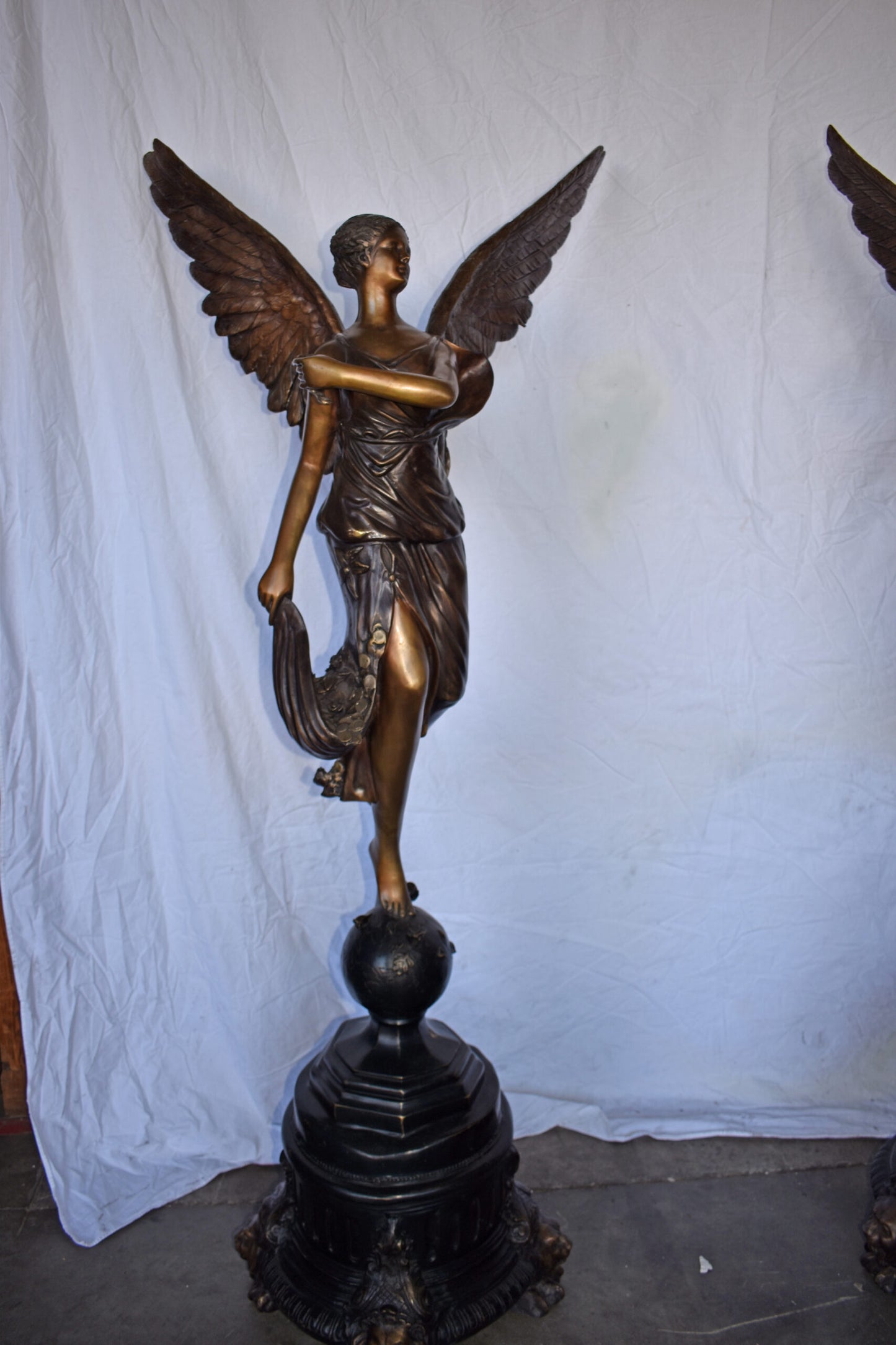 A Pair of Angels of Fortune Bronze Statues  Size: 27" x 27" x 69"H