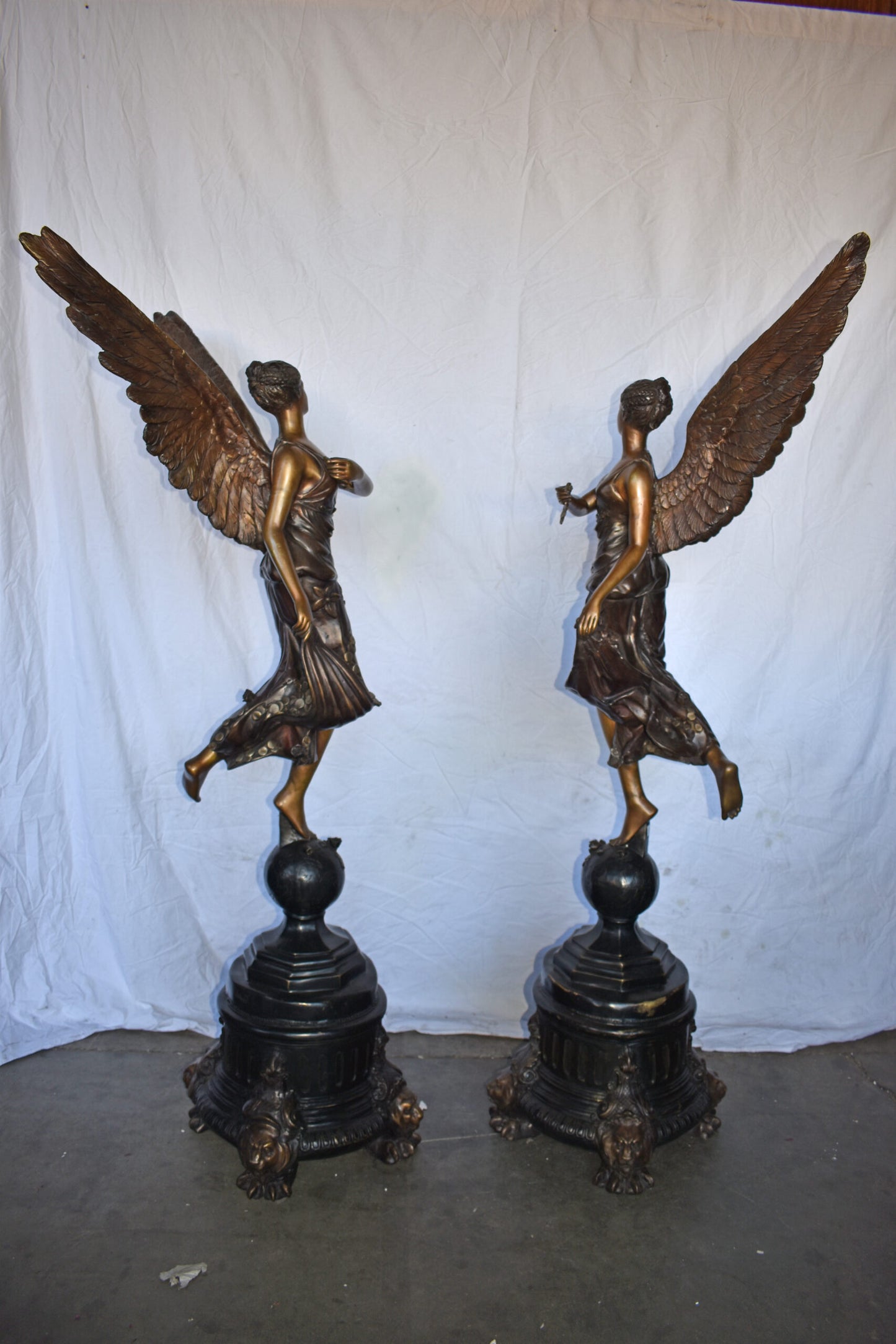 A Pair of Angels of Fortune Bronze Statues  Size: 27" x 27" x 69"H
