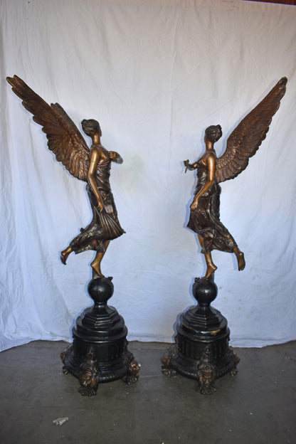 A Pair of Angels of Fortune Bronze Statues  Size: 27" x 27" x 69"H