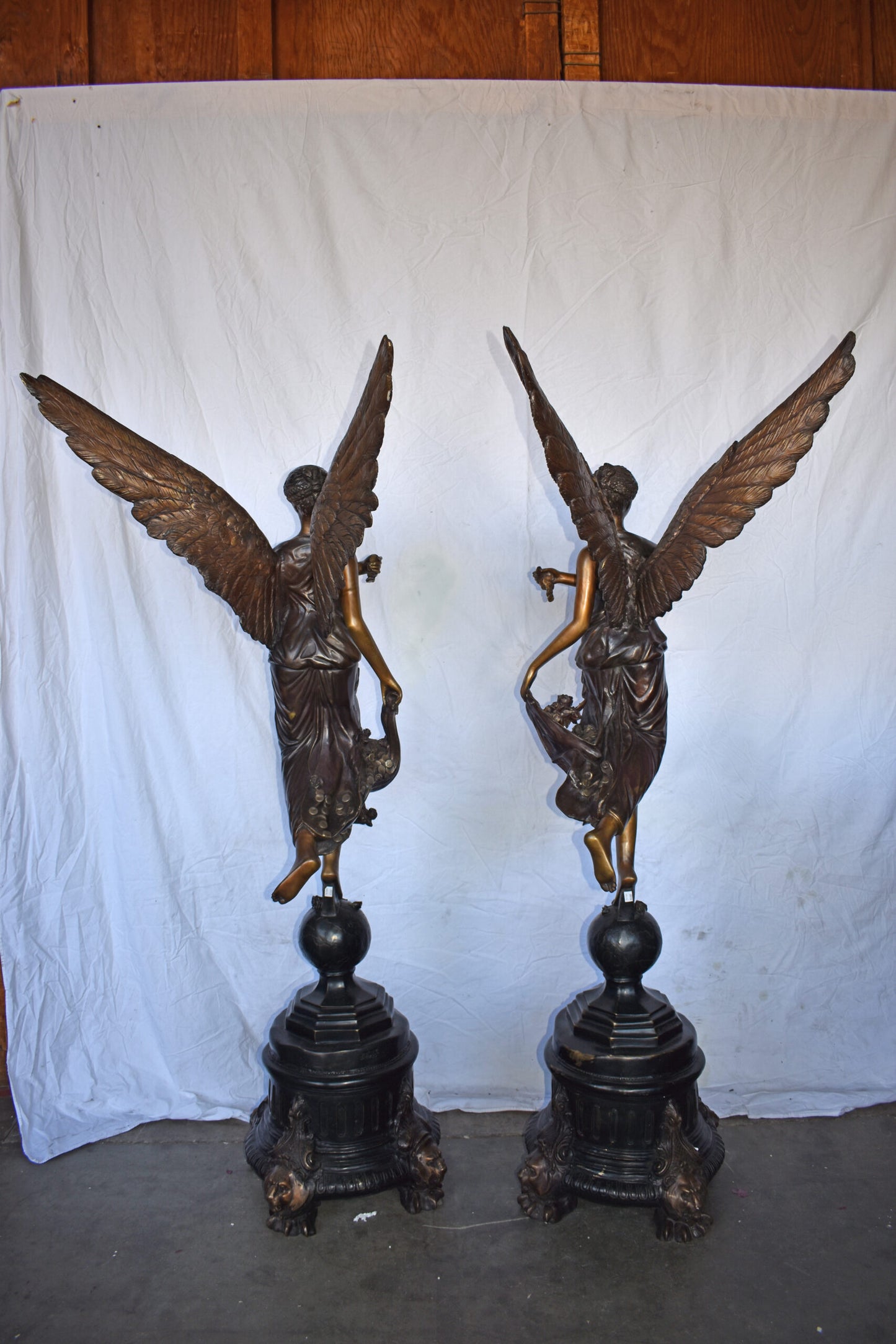 A Pair of Angels of Fortune Bronze Statues  Size: 27" x 27" x 69"H