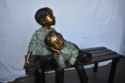 Brother and Sister on A Bench Enjoying Outdoors Bronze Statue  18" x 39" x 33"H
