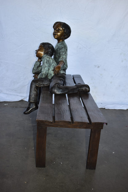 Brother and Sister on A Bench Enjoying Outdoors Bronze Statue  18" x 39" x 33"H