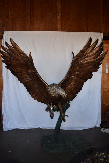 Giant Eagle Catching His Prey in Action Bronze Statue Size: 84" x 40" x 84"H