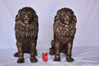 A Pair of Lions Sitting on The Ground Bronze Statues Size: 14" x 27" x 29"H