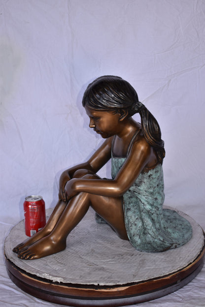 Girl Sitting on The Ground Enjoying the Sun Bronze Statues  22" x 15" x 19"H