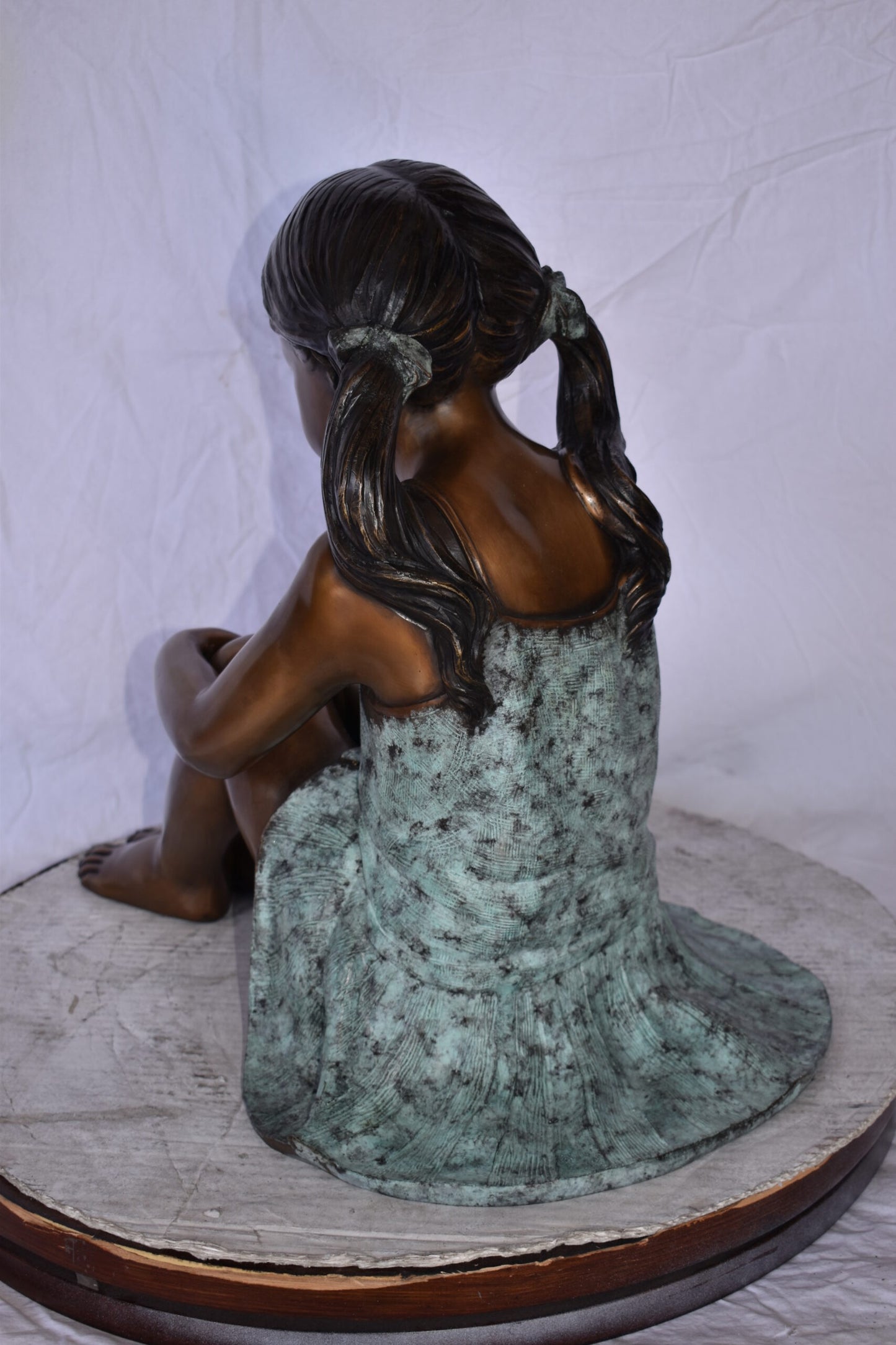 Girl Sitting on The Ground Enjoying the Sun Bronze Statues  22" x 15" x 19"H