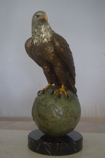 Bald Eagle Standing on a Globe Bronze Statue -  Size: 17"L x 9"W x 23"H.