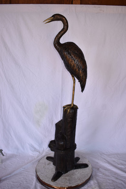 Crane Looking Out Standing on A Tree Stump Bronze Statue Size: 19" x 17" x 62"H