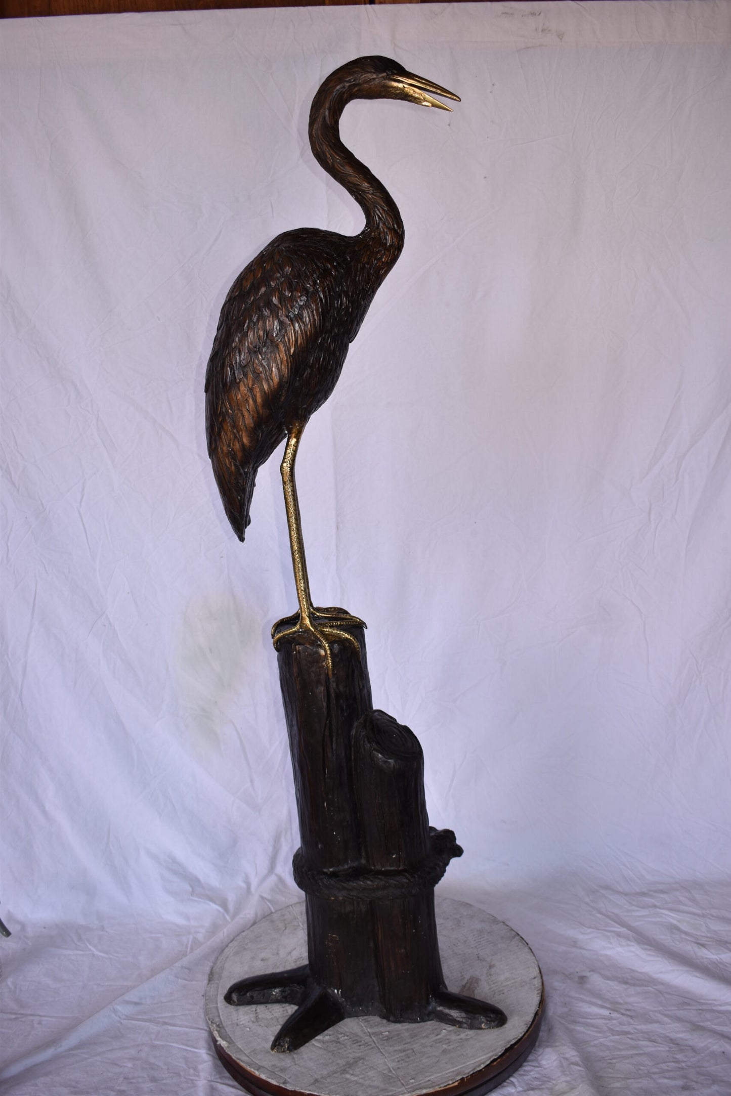 Crane Looking Out Standing on A Tree Stump Bronze Statue Size: 19" x 17" x 62"H