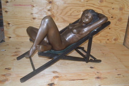 Life Size Young Art Nude Catching Sun on Beach Chair -  Size: 45"L x 22"W x 30"H.