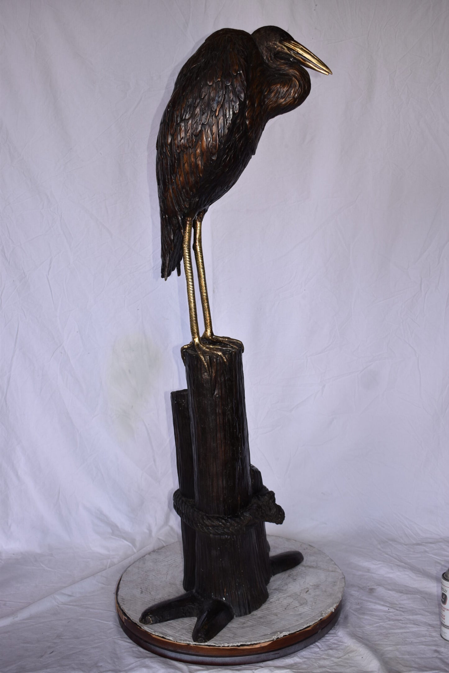 Crane Head Down Standing on A Tree Stump Bronze Statue Size: 23" x 16" x 55"H