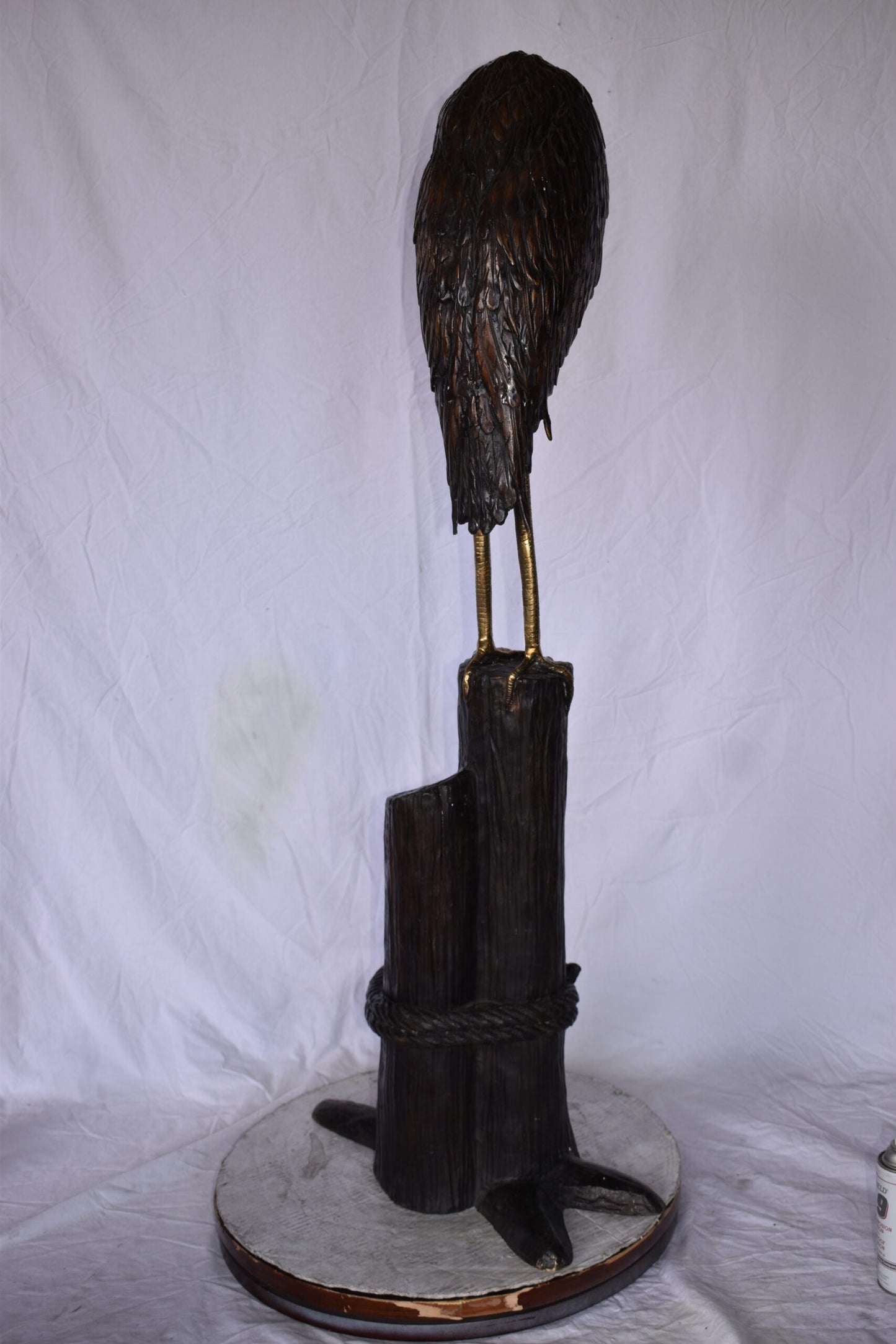 Crane Head Down Standing on A Tree Stump Bronze Statue Size: 23" x 16" x 55"H