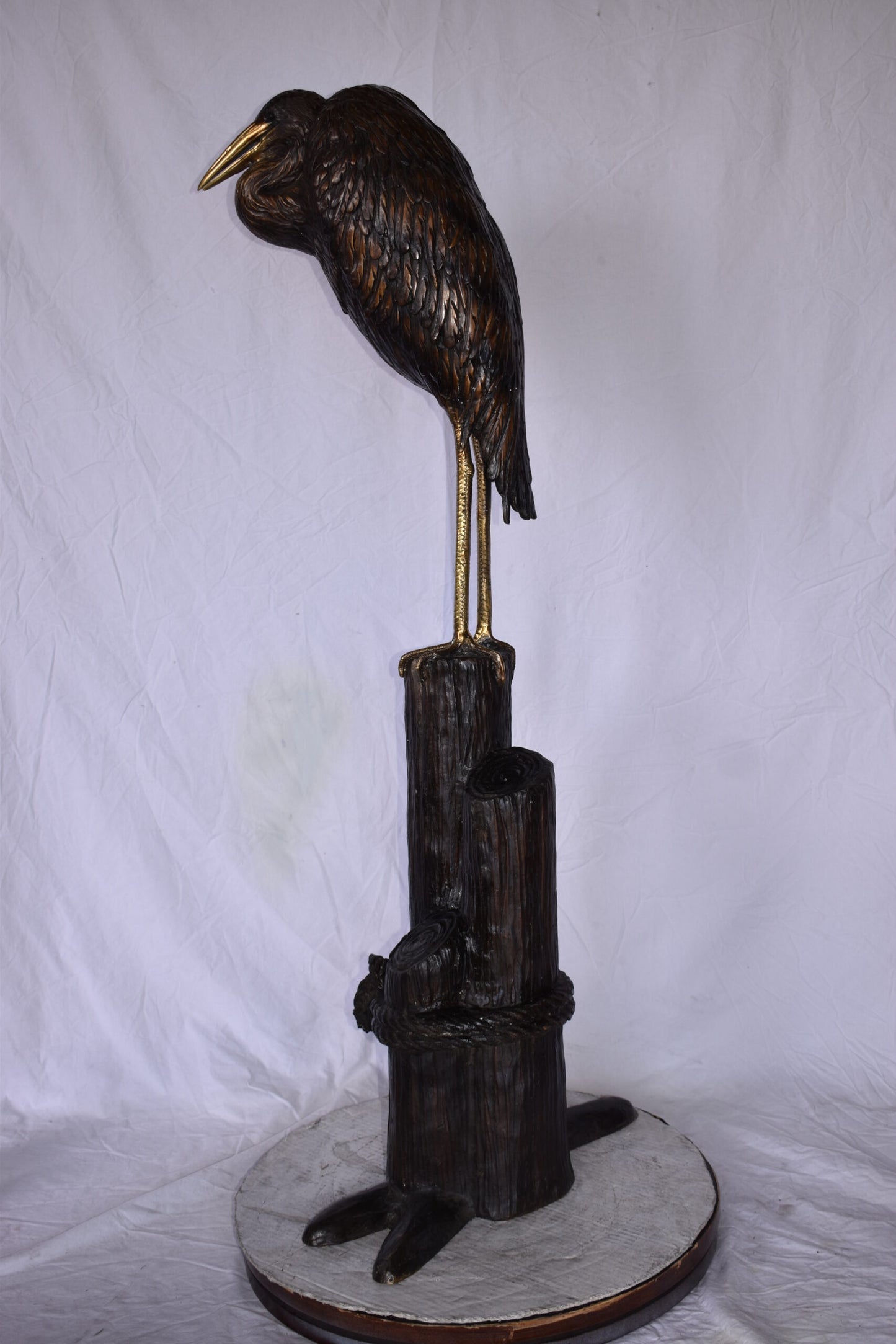 Crane Head Down Standing on A Tree Stump Bronze Statue Size: 23" x 16" x 55"H