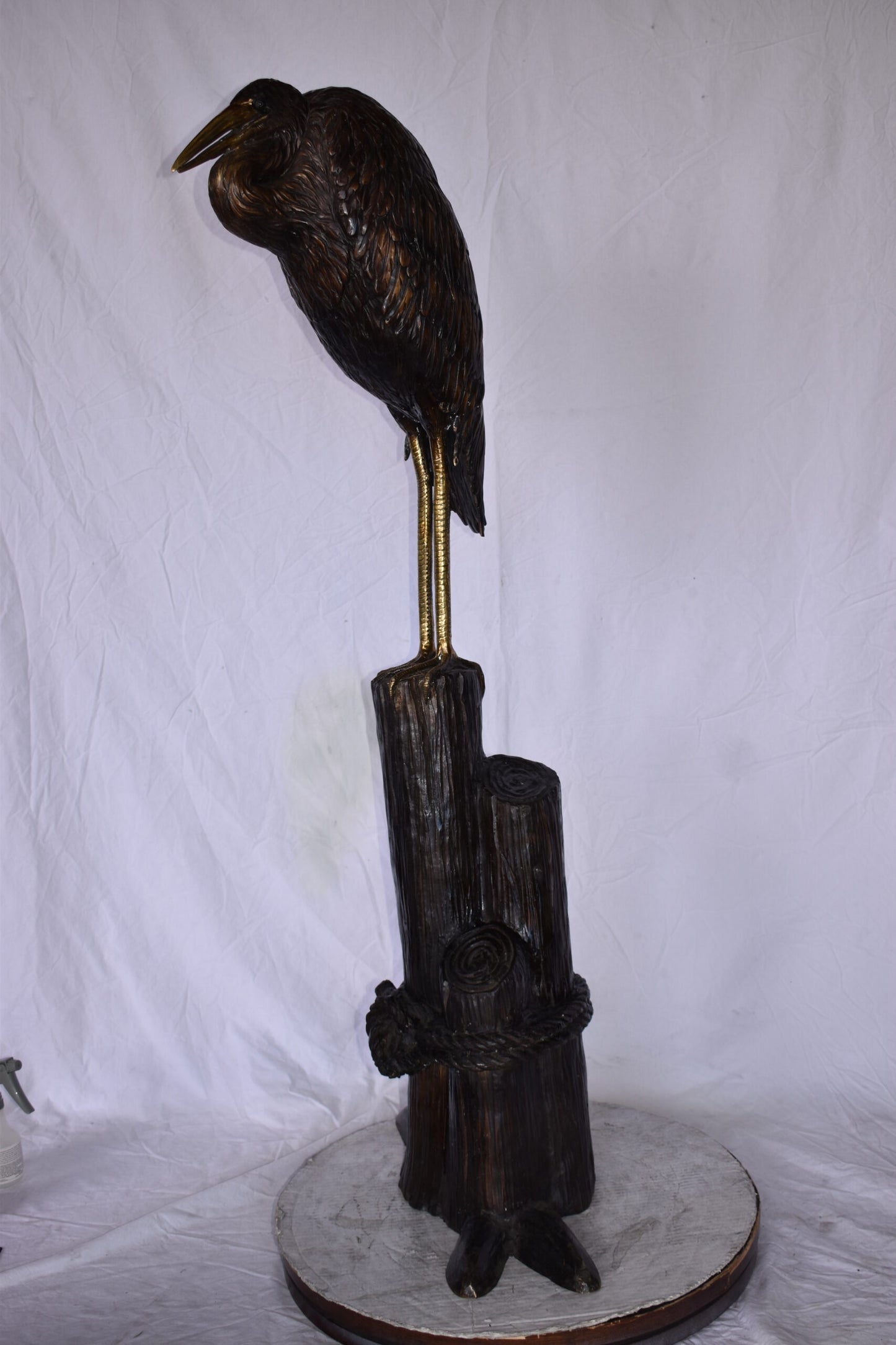 Crane Head Down Standing on A Tree Stump Bronze Statue Size: 23" x 16" x 55"H