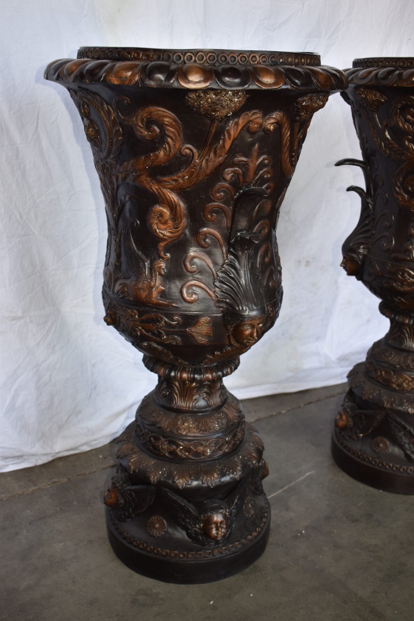 A Large Pair of Urns with Lady Faces Bronze Statue Size: 23" x 23" x 43"H