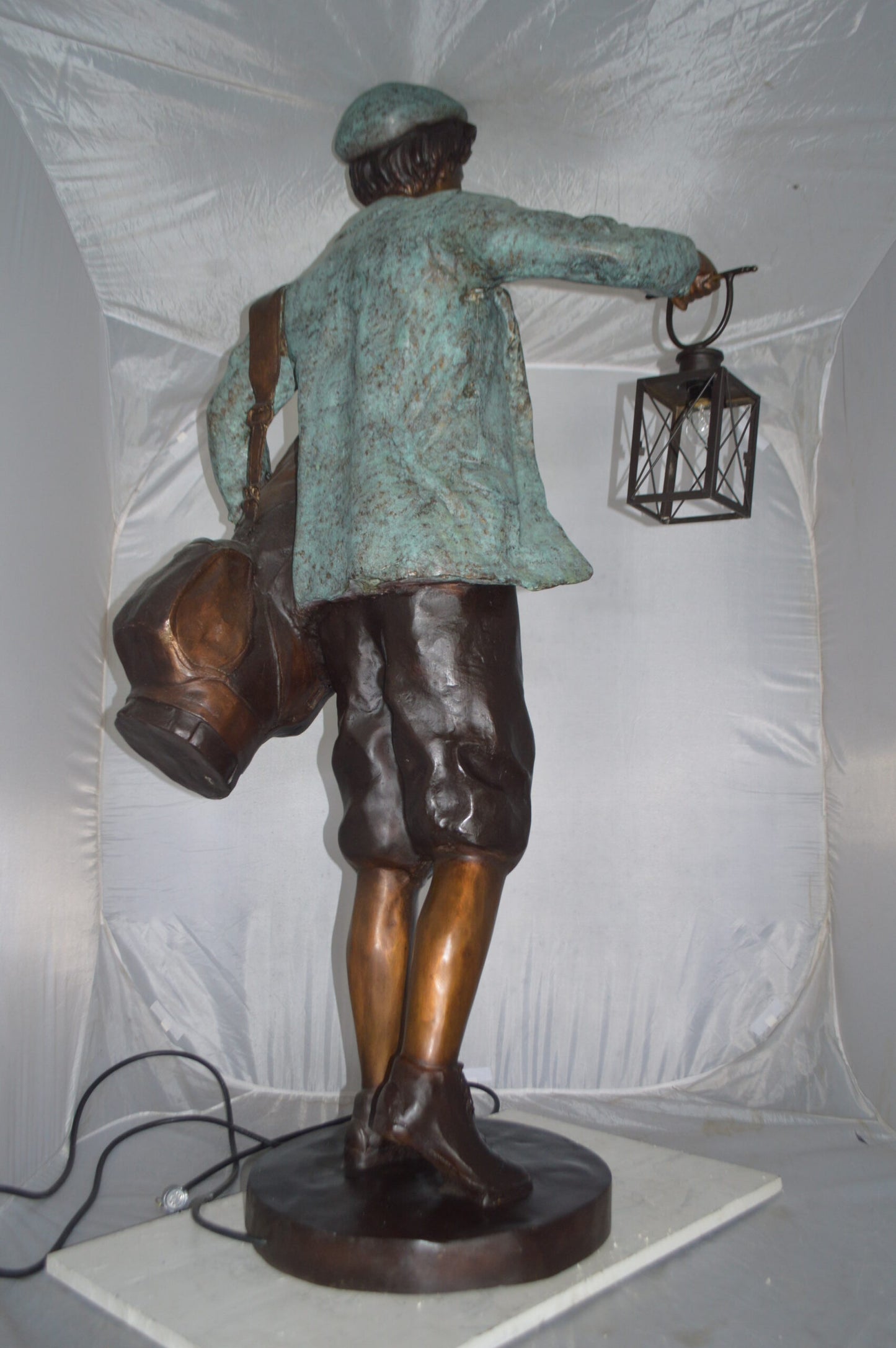 Caddy with light Bronze Statue -  Size: 30"L x 36"W x 64"H.
