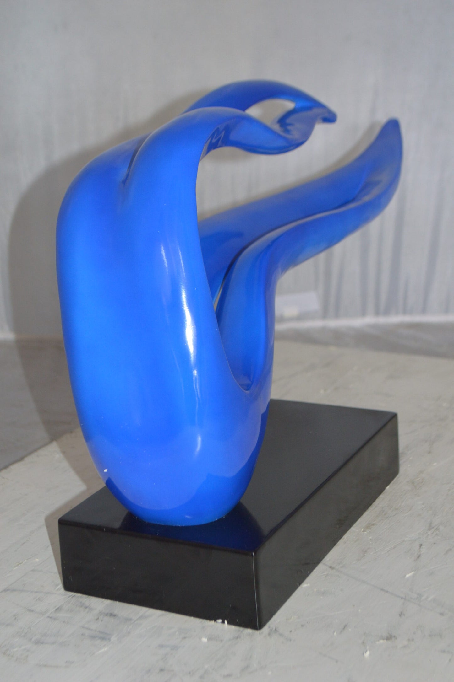 Modern Art Blue Ribbon Resin Statue -  Size: 25"L x 6"W x 13"H.