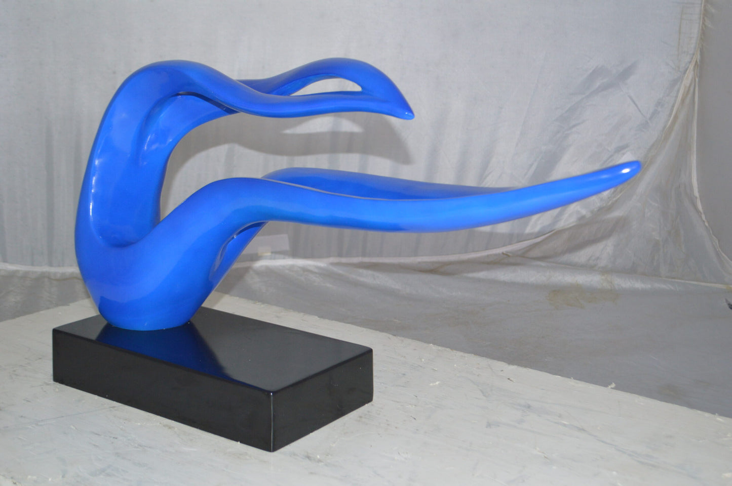 Modern Art Blue Ribbon Resin Statue -  Size: 25"L x 6"W x 13"H.