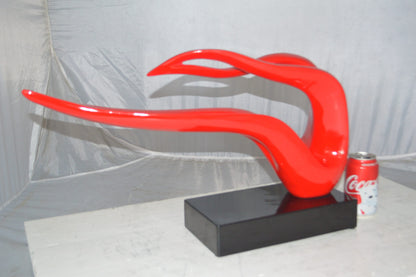 Modern Art Red Ribbon Resin Statue -  Size: 25"L x 6"W x 13"H.