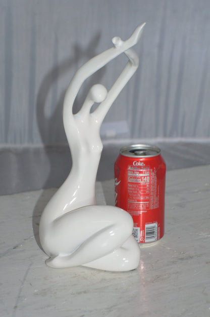 Modern Art Dancer in Action White Resin Statue -  Size: 4"L x 6"W x 13"H.