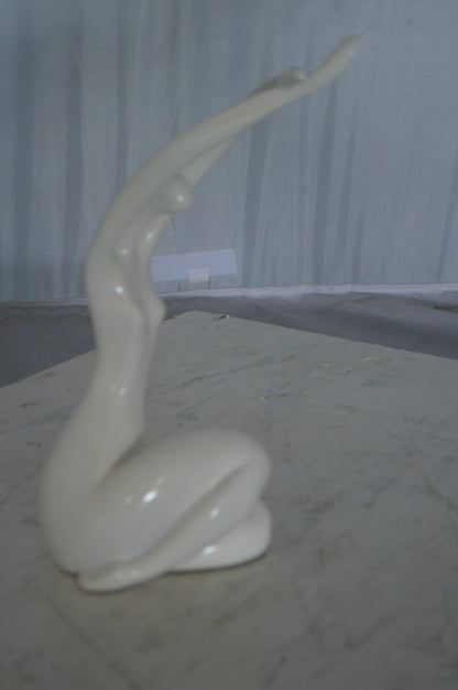 Modern Art Dancer in Action White Resin Statue -  Size: 4"L x 6"W x 13"H.