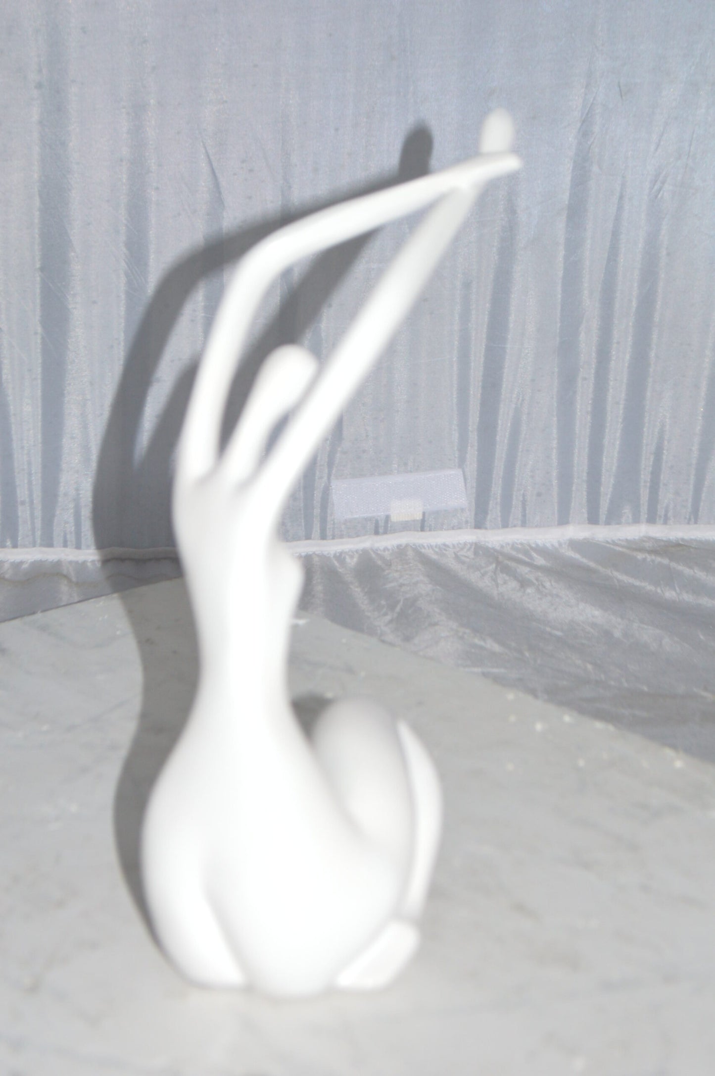 Modern Art Dancer in Action White Resin Statue -  Size: 4"L x 6"W x 13"H.