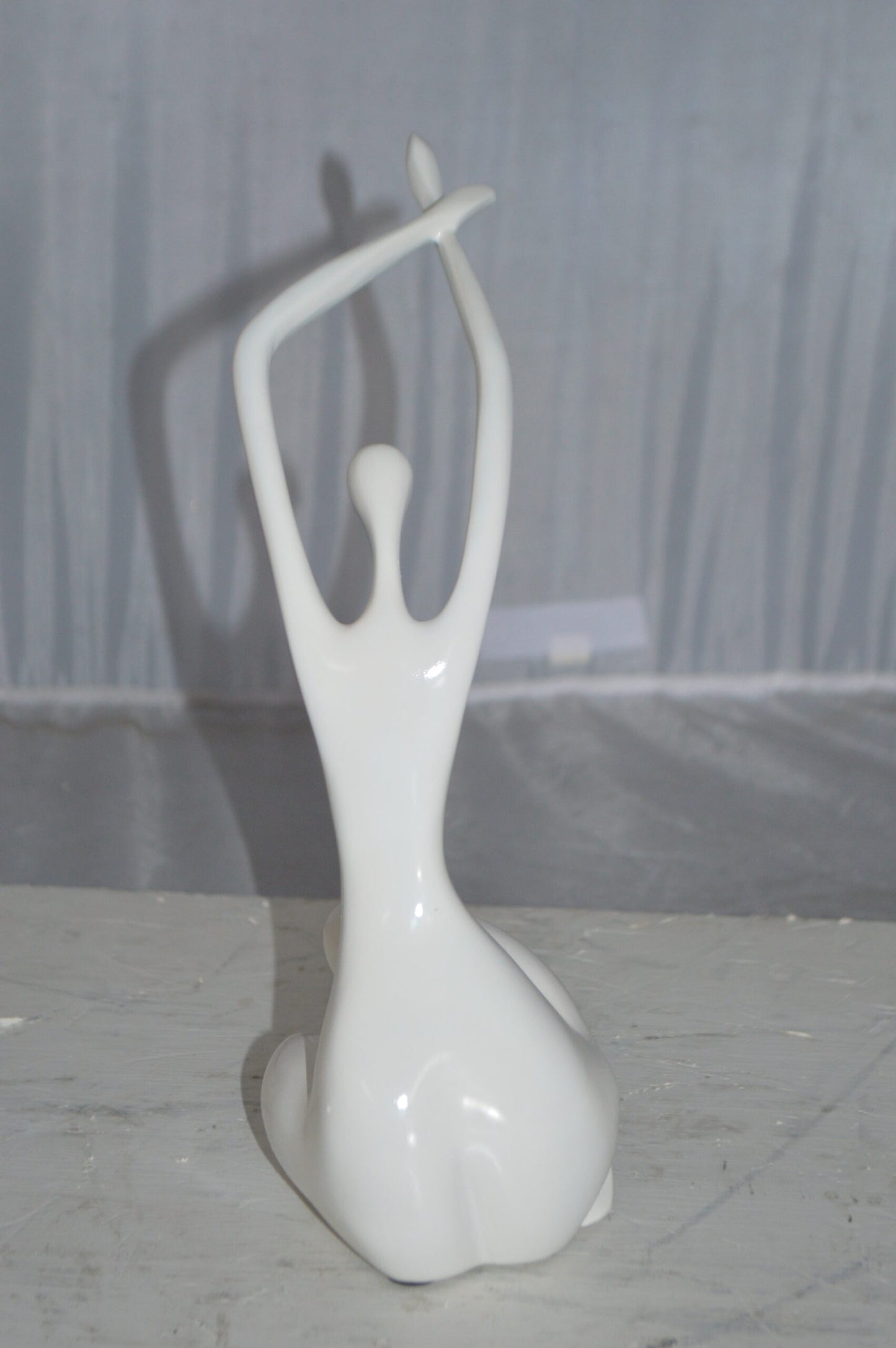 Modern Art Dancer in Action White Resin Statue -  Size: 4"L x 6"W x 13"H.