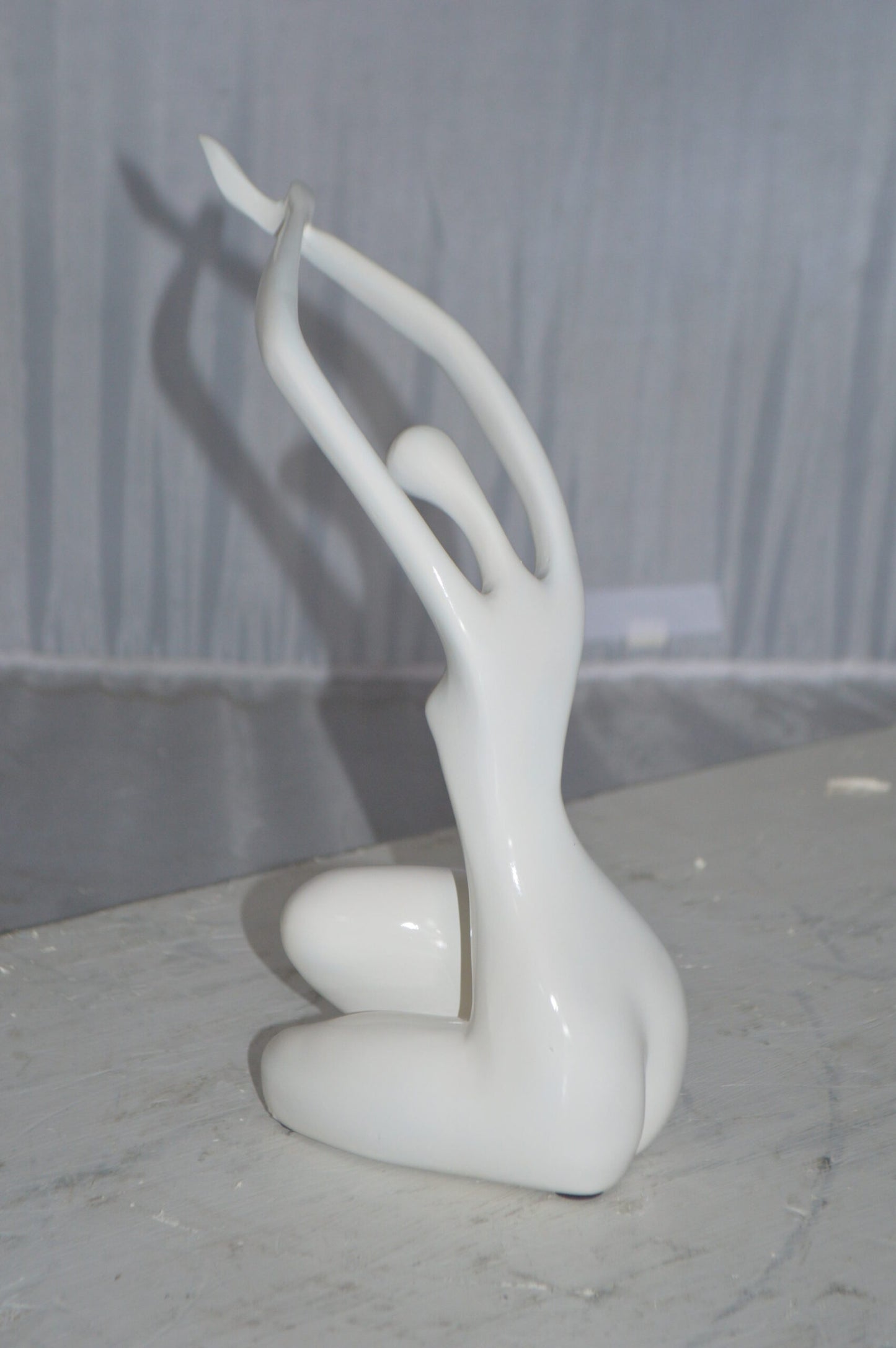Modern Art Dancer in Action White Resin Statue -  Size: 4"L x 6"W x 13"H.