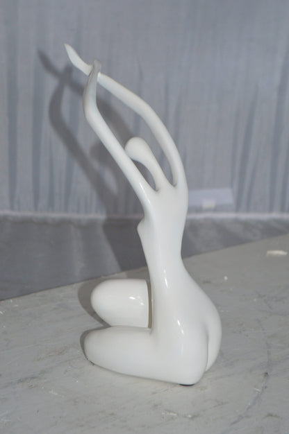 Modern Art Dancer in Action White Resin Statue -  Size: 4"L x 6"W x 13"H.