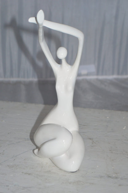 Modern Art Dancer in Action White Resin Statue -  Size: 4"L x 6"W x 13"H.
