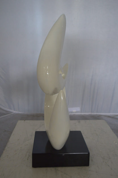 Modern Art White Boomerang Statue made of Resin -  Size: 13"L x 8"W x 23"H.
