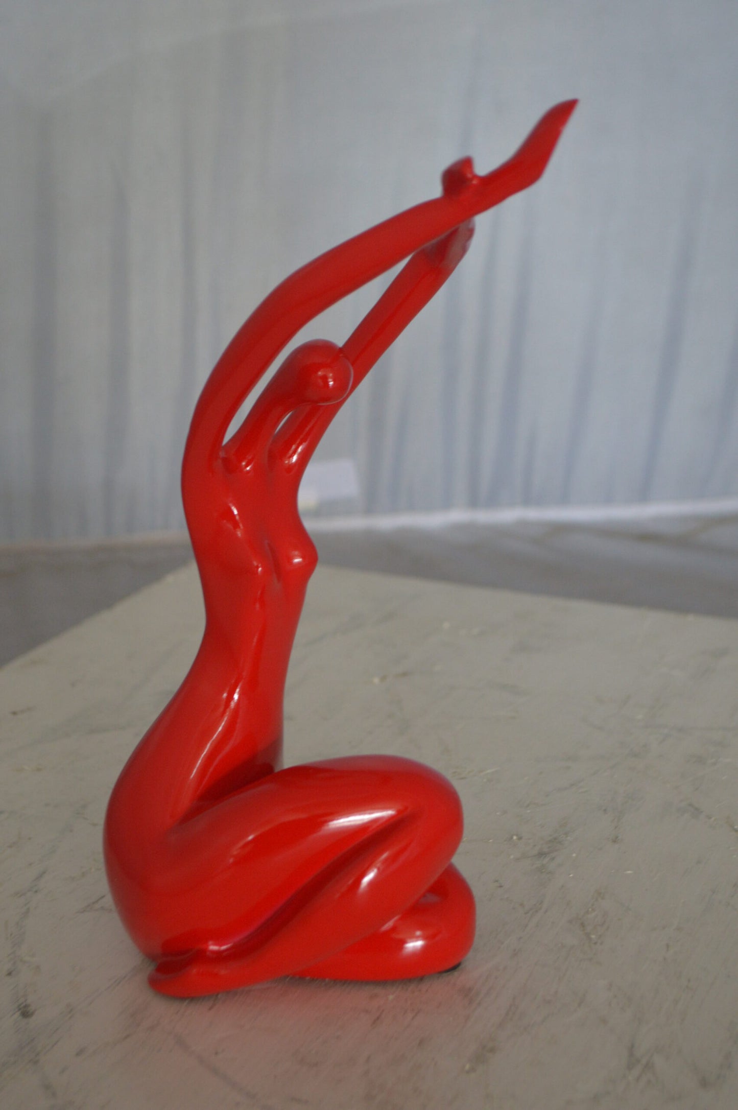Modern Art Dancer in Action Red Resin Statue -  Size: 4"L x 6"W x 13"H.