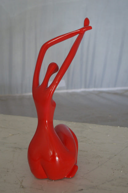 Modern Art Dancer in Action Red Resin Statue -  Size: 4"L x 6"W x 13"H.