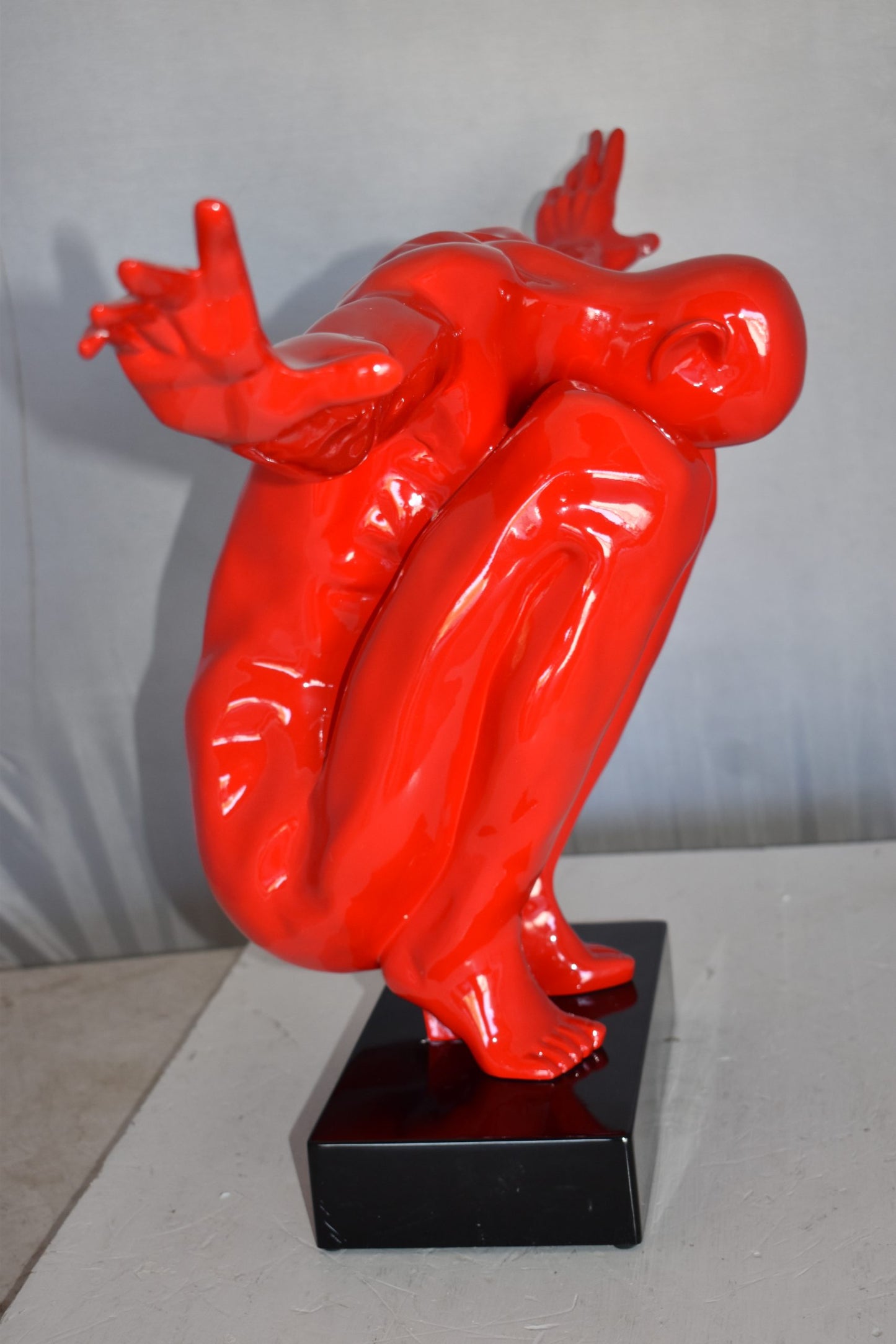 Red Saluting Body Builder Made of Resin Mounted on A Base Size: 37" x 14" x 19"H