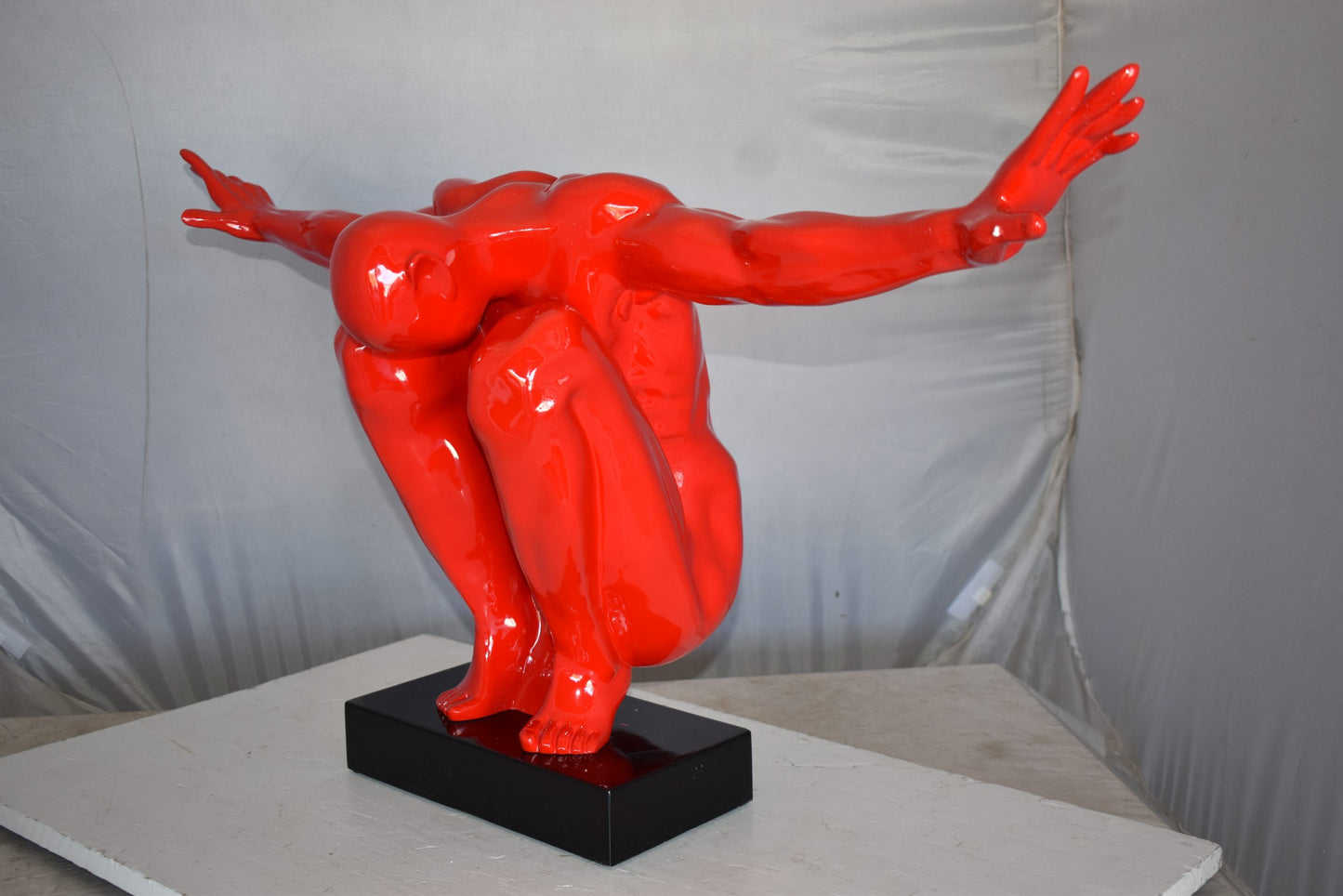 Red Saluting Body Builder Made of Resin Mounted on A Base Size: 37" x 14" x 19"H