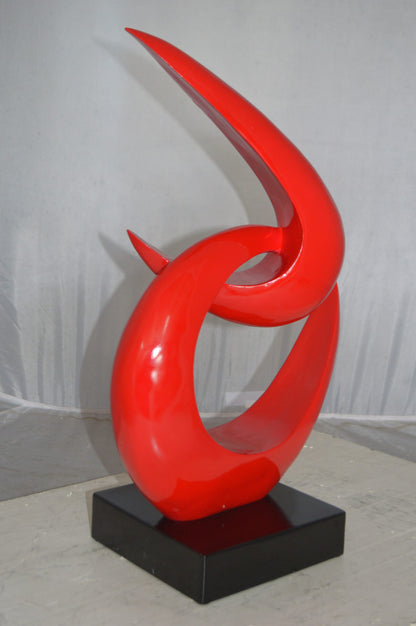 Modern Art Red Boomerang Statue made of Resin -  Size: 13"L x 8"W x 23"H.