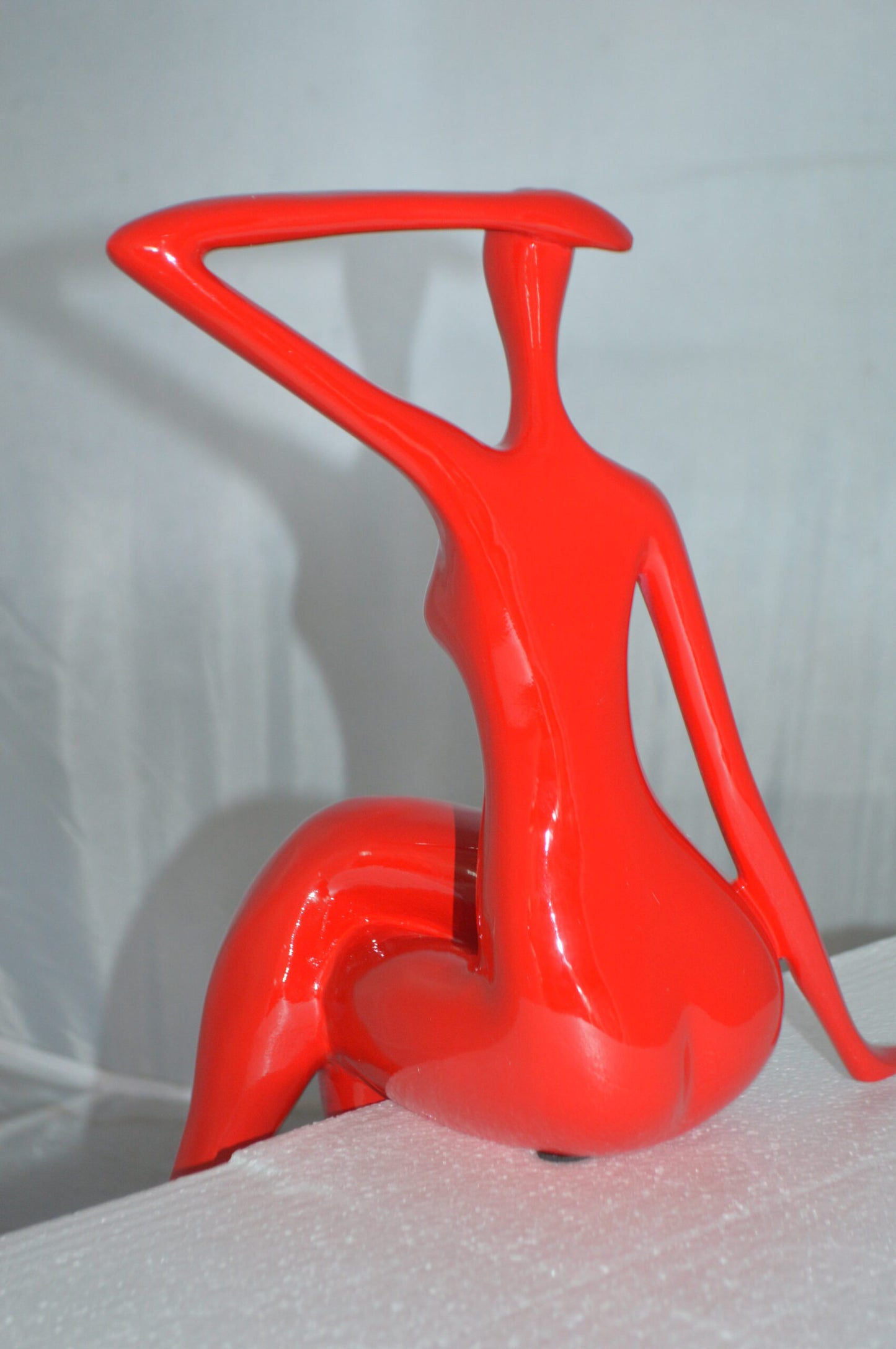 Modern Art Sitting on Edge Girl Made of Resin -  Size: 9"L x 7"W x 16"H.