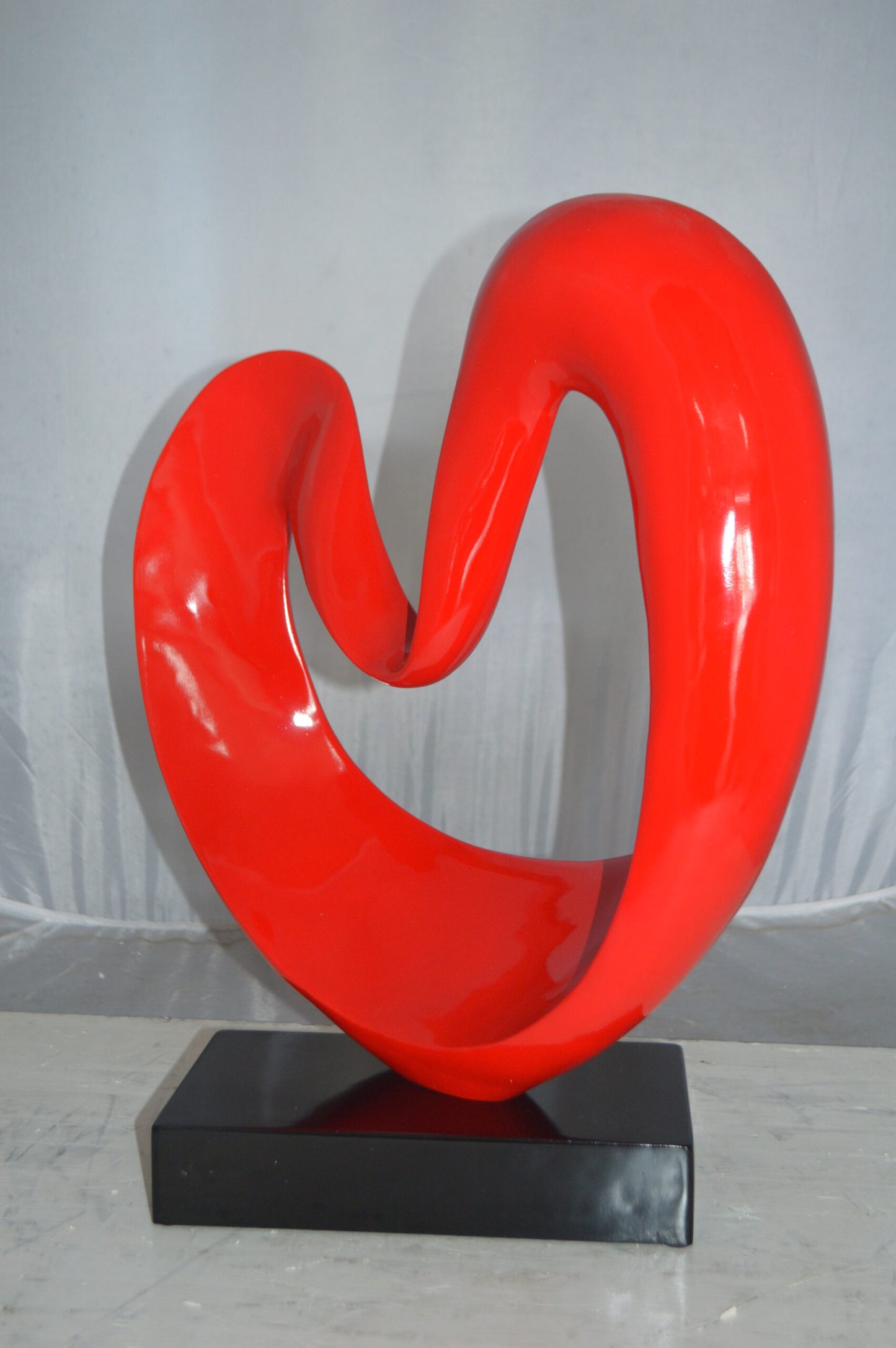 Modern Art Red Love Statue Made of Resin -  Size: 19"L x 6"W x 22"H.