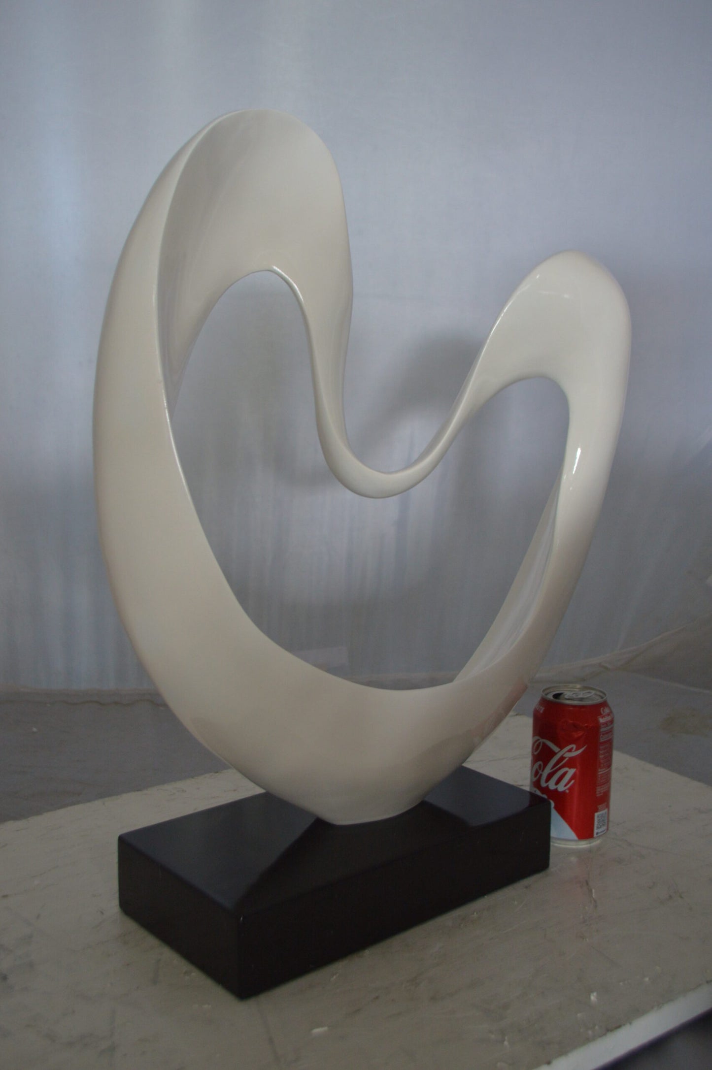 Modern Art White Love Statue Made of Resin -  Size: 19"L x 6"W x 22"H.