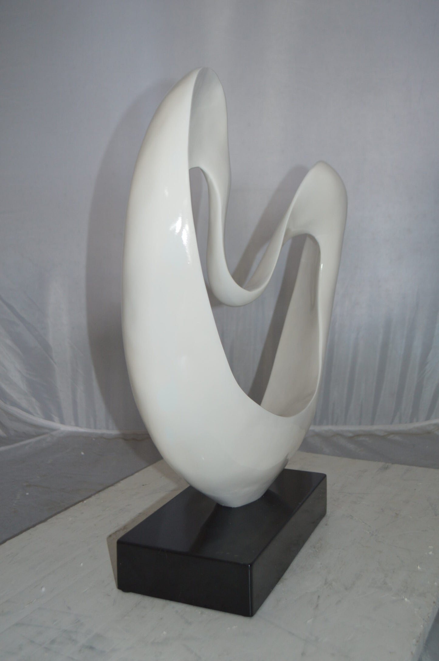 Modern Art White Love Statue Made of Resin -  Size: 19"L x 6"W x 22"H.