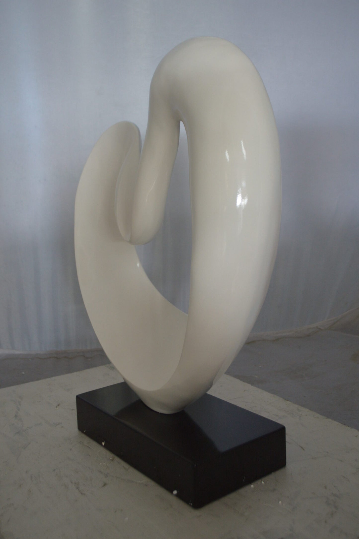 Modern Art White Love Statue Made of Resin -  Size: 19"L x 6"W x 22"H.