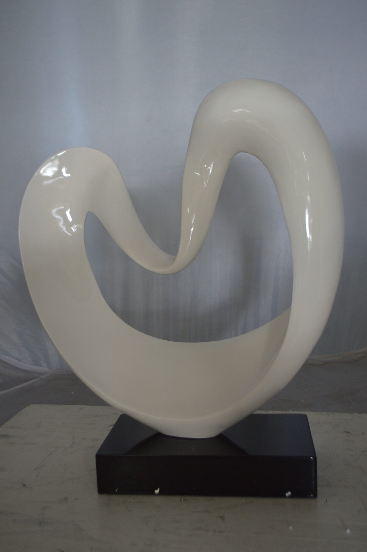 Modern Art White Love Statue Made of Resin -  Size: 19"L x 6"W x 22"H.