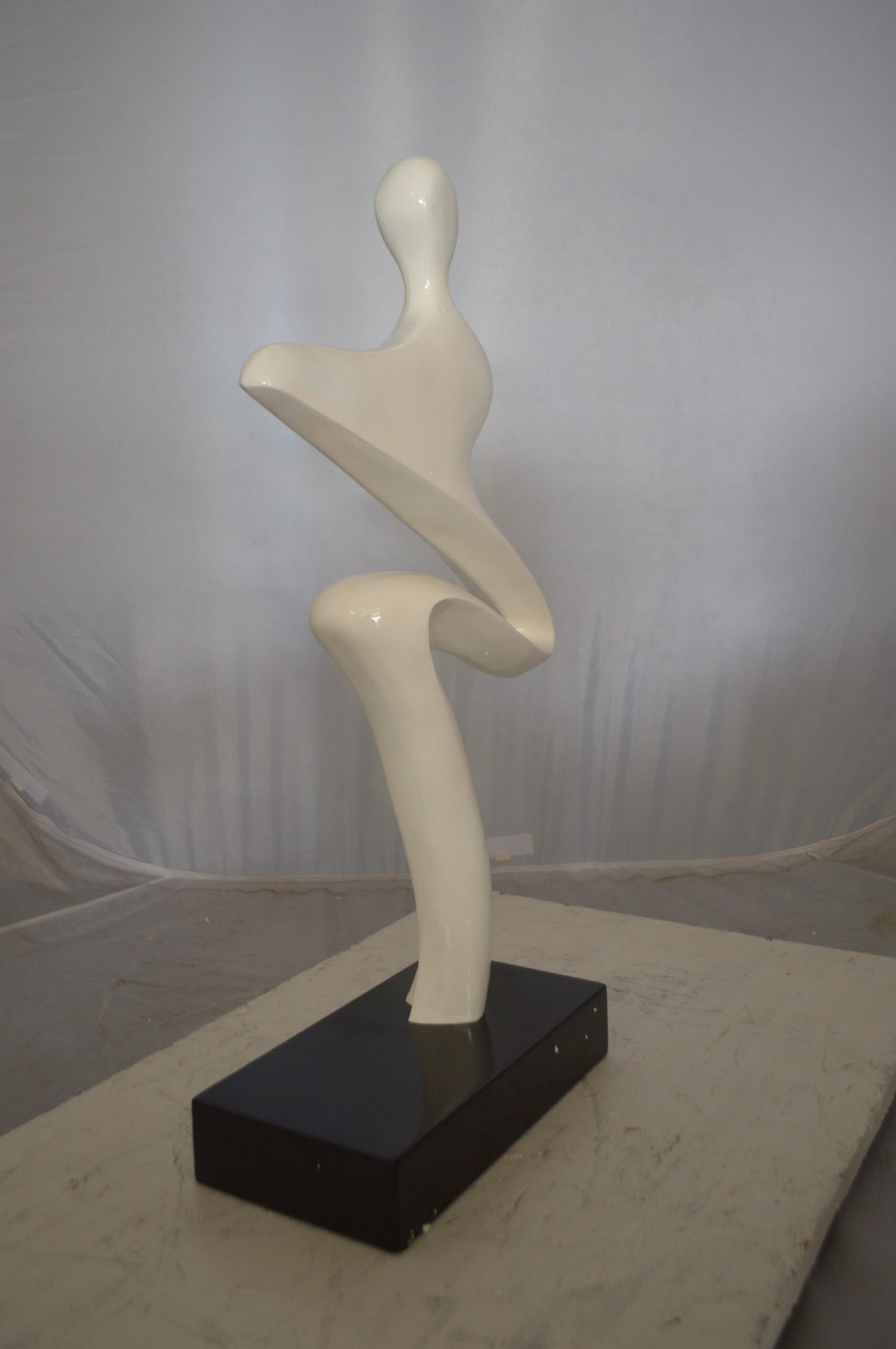 Modern Art Windy Day Resin Statue -  Size: 15"L x 6"W x 24"H.