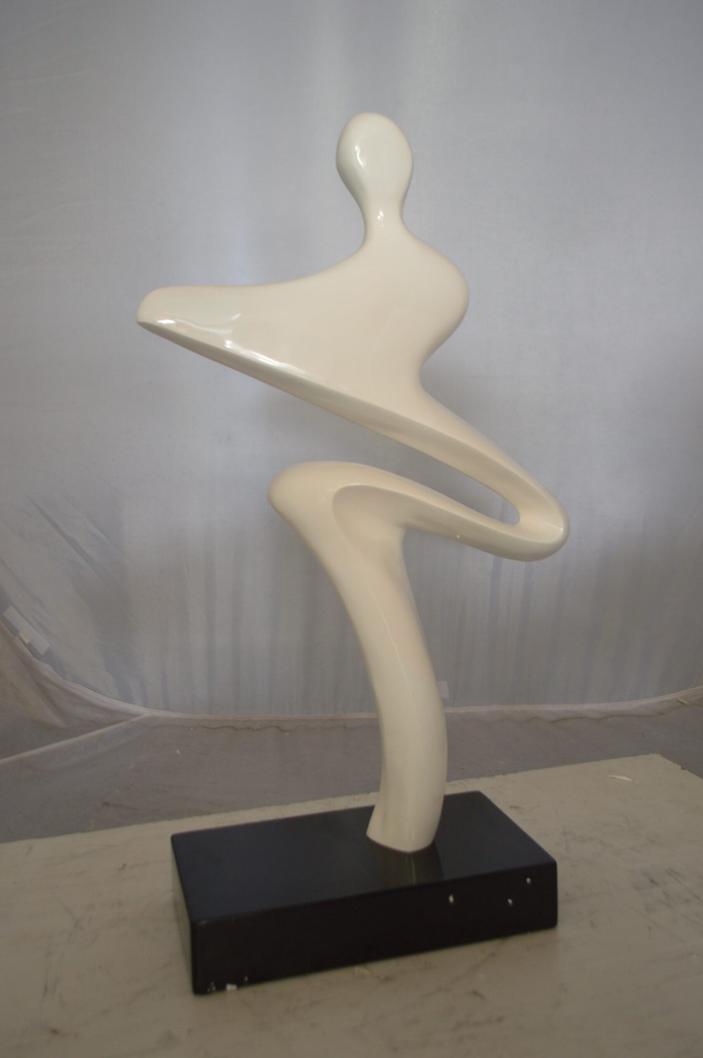 Modern Art Windy Day Resin Statue -  Size: 15"L x 6"W x 24"H.