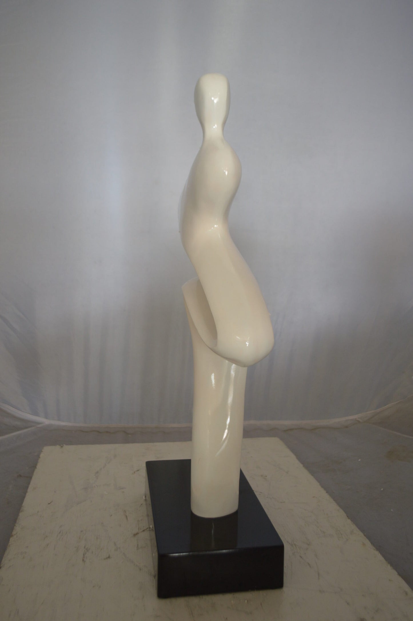 Modern Art Windy Day Resin Statue -  Size: 15"L x 6"W x 24"H.