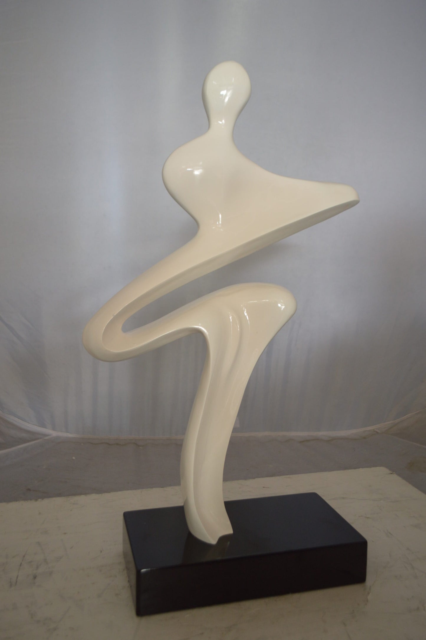 Modern Art Windy Day Resin Statue -  Size: 15"L x 6"W x 24"H.